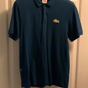 Lacoste polo in jewel blue, size 5 from the Live! collection.